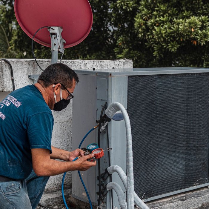 HVAC business owner on a service call